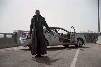 Morpheus prepares for Avis to go mental about the state of their rental Matrix Reloaded image