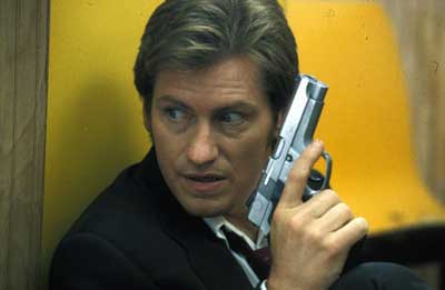 Maybe we're going to get lucky here and Leary will shoot himself DEAD in the first five minutes! Double Whammy image