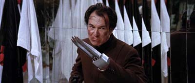 Han merely wanted to present Lee with his prize; an attractive set of steak knives. Enter the Dragon image