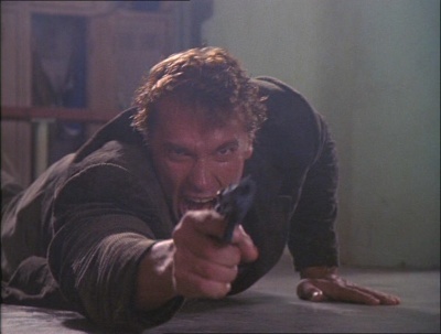It's a movie with kids, Arnie can't possibly shoot any shit up. Oh yes he can. Woohoo! Kindergarten Cop image