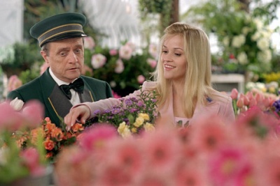 Having been cruelly starved for days, the doorman eyed up Elle's arm. Legally Blonde 2 image
