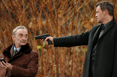 Tell me what's going on or I'll shoot you in the face Warsaw Dark image