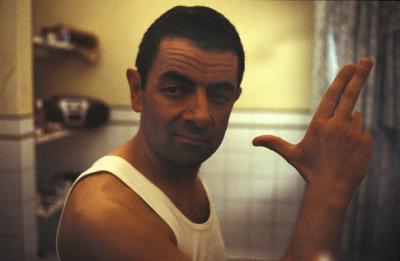 He knows no fear. He knows no danger. He knows no shame. Johnny English image