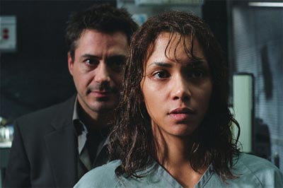 Robert Downey Jr. in a role that turns out to be so superfluous he doesn't warrant a mention. Gothika image